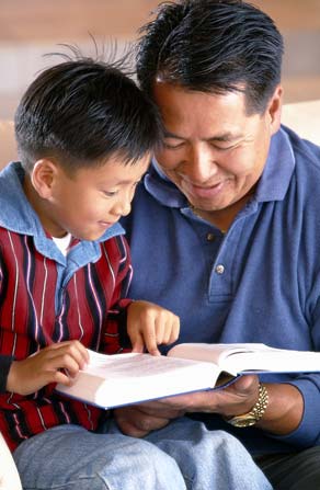 man and his son reading